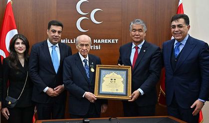 MHP Genel Başkanı Bahçeli'ye "Ahmed Cevad Onur Madalyası" verildi
