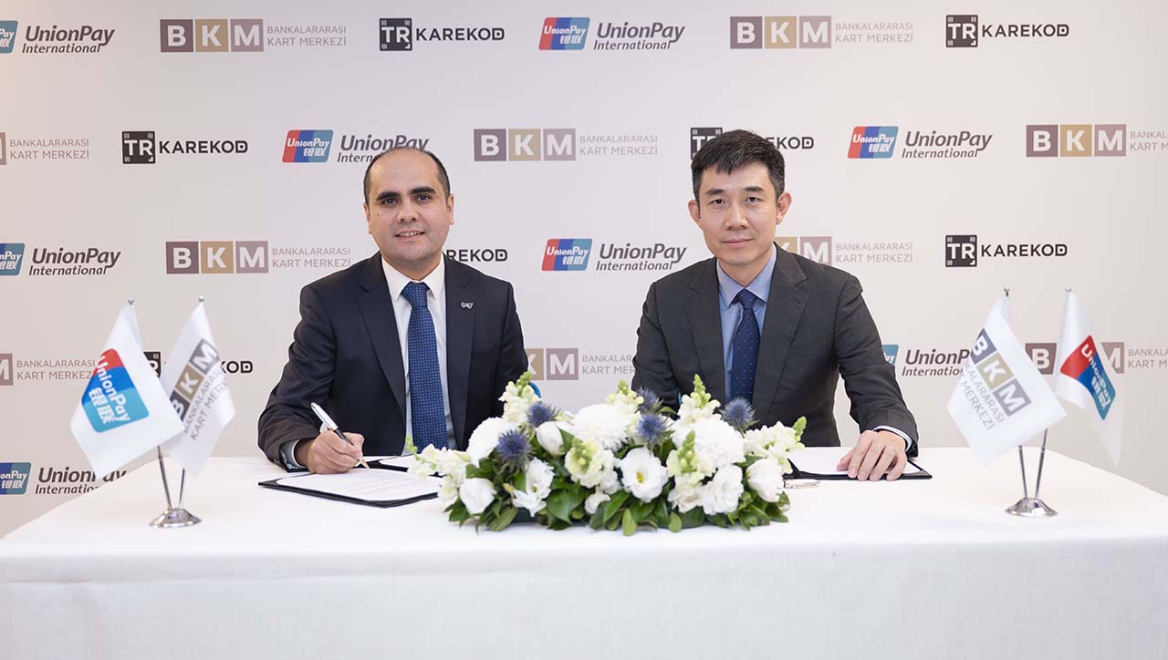 Ozan Deniz & Luping Zhang